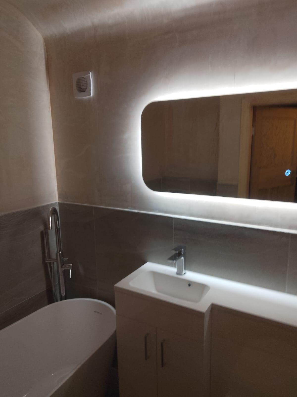 Fitted bathroom with illuminated mirror thumbnail