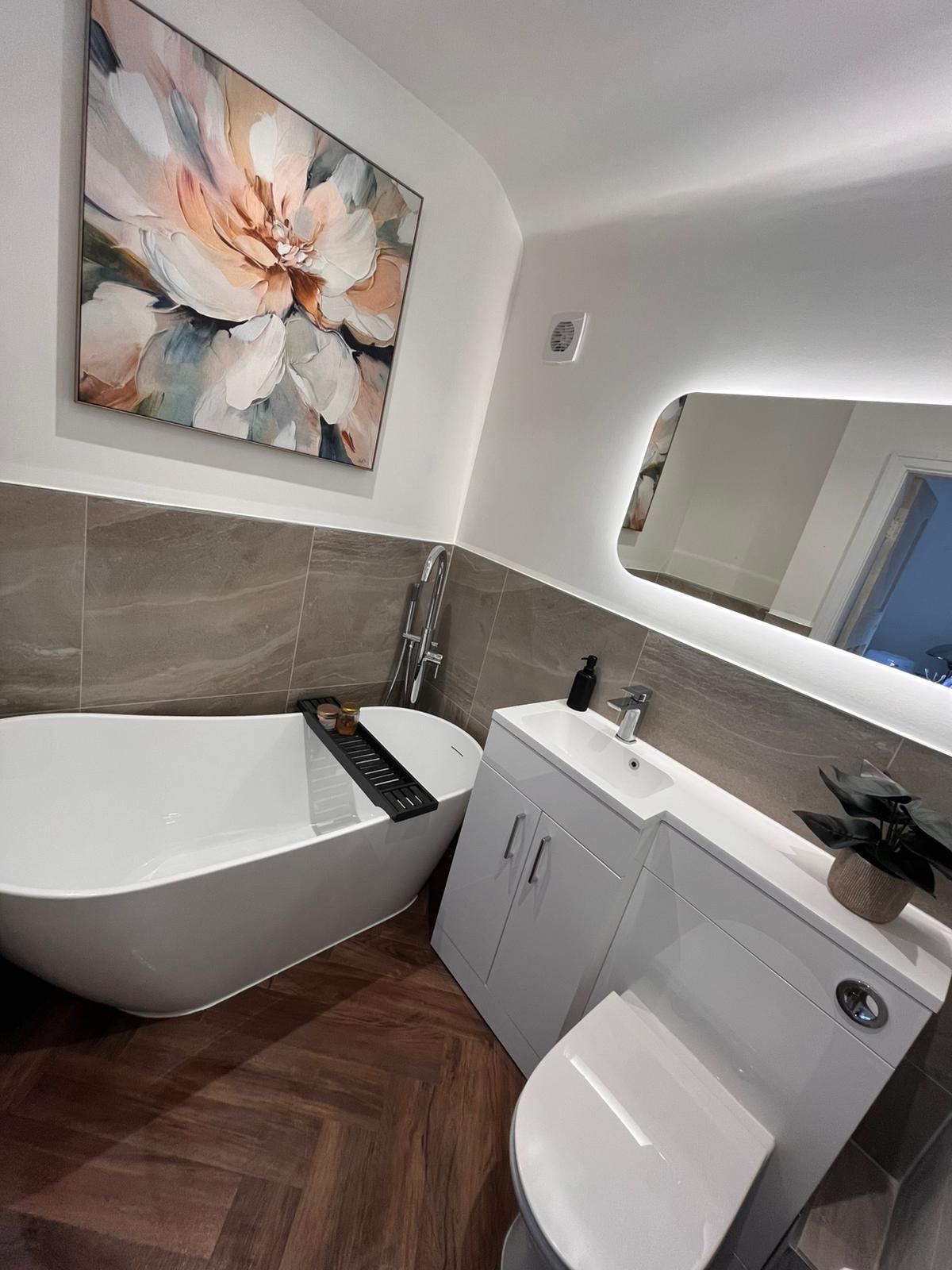 Modern bathroom with vanity and bath thumbnail